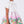 Load image into Gallery viewer, chic dress with floral skirt and a bow around the neck