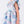 Load image into Gallery viewer, one-shoulder dress featuring cascading ruffles and a pastel countryside-inspired print