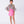 Load image into Gallery viewer, A vibrant floral blouse with dramatic bell sleeves, paired with a pink ruffled skirt