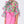 Load image into Gallery viewer, vibrant floral blouse with dramatic bell sleeves, paired with a pink ruffled skirt