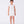 Load image into Gallery viewer, white sequined dress with a bow on the waist