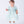 Load image into Gallery viewer, Adorable puff-sleeve baby dress crafted from soft satin with jeweled buttons and pleated detailing. Available in pastel mint and blush pink—perfect for birthdays, holidays, and special family moments. Comfortable, elegant, and picture-ready!
