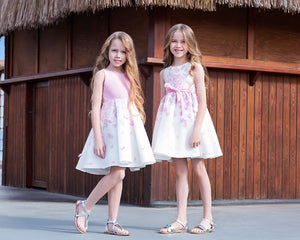 Ecru and pink dresses with 3D rose petals for little girls