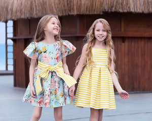 baby blue, pastel flower printed dress with a big yellow striped bow and yellow striped bow summer dress