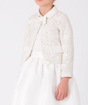 Stylish ivory floral jacket with a white skirt