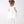 Load image into Gallery viewer, Charming white baby dress with a flared silhouette, Peter Pan collar, and delicate floral accents at the waist
