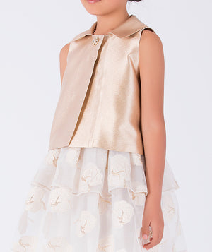 Shimmering gold top and a layered ivory organza skirt