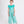 Load image into Gallery viewer, mint ruffled blouse and shimmery feathered pants
