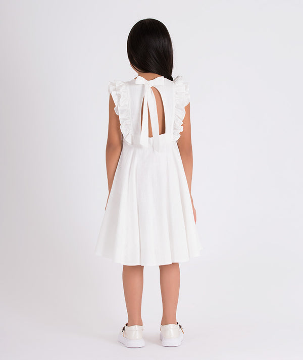 white summer dress with an open back