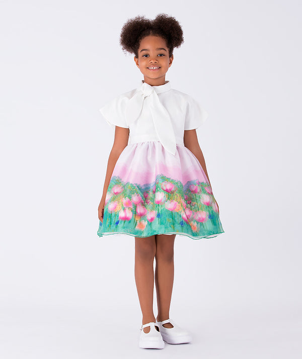 chic floral dress with a bow around the neck