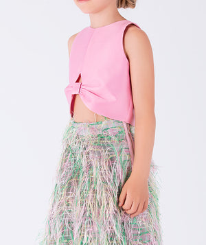pink sleeveless bow blouse and colorful fringy pants