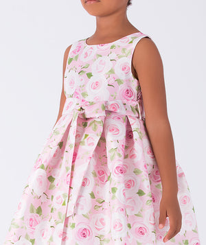 sleeveless pink floral dress with a belt