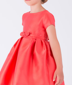 structured coral dress featuring a little bow on the waist