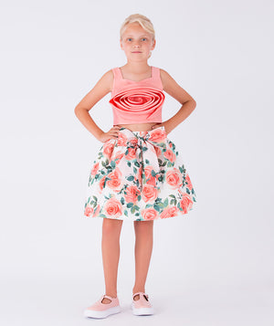 A chic crop top and skirt combo adorned with blooming florals
