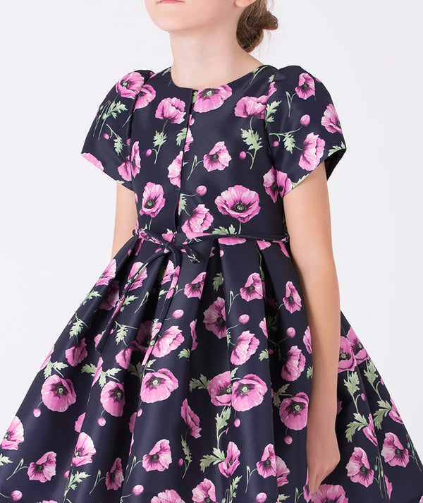 Charming floral-print dress with a little bow on the waist and a round neckline