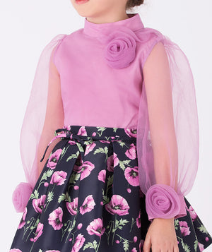 Elegant lilac blouse with sheer sleeves and delicate 3D rose details, paired with a navy skirt adorned with purple orchid prints