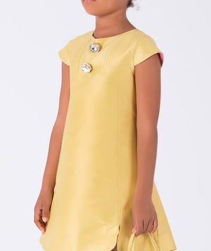 chic yellow dress with sparkling buttons