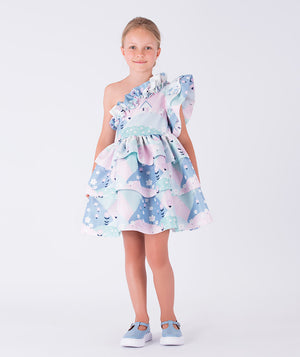 Whimsical one-shoulder dress featuring cascading ruffles and a pastel countryside-inspired print