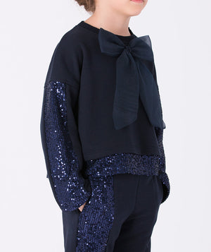 Casual navy set with a playful bow and a hint of sparkle