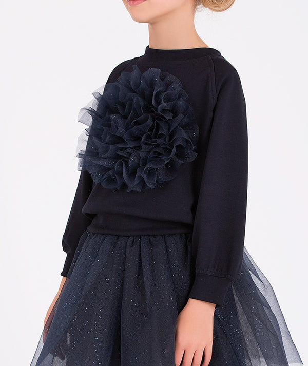 Chic girls' navy tulle skirt and navy top adorned with a statement flower design