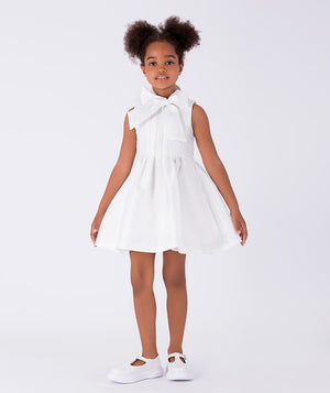 chic white dress with a bow on the neck