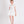 Load image into Gallery viewer, white dress with 3D rose detail on the front
