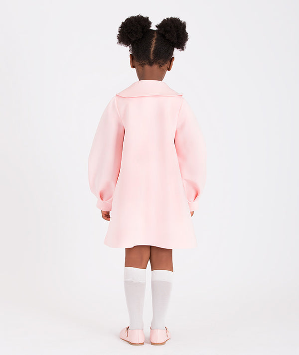 Adorable pink coat with bow embellishment