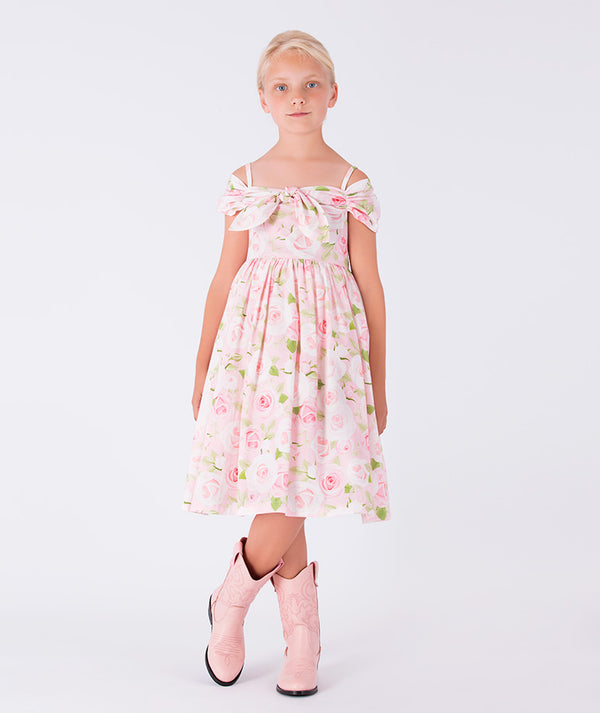 pink off-shoulder floral dress with a bow
