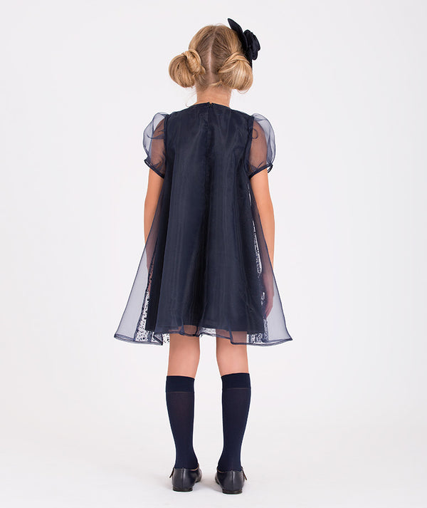 Navy tulle and sequin dress with puff sleeves and bow