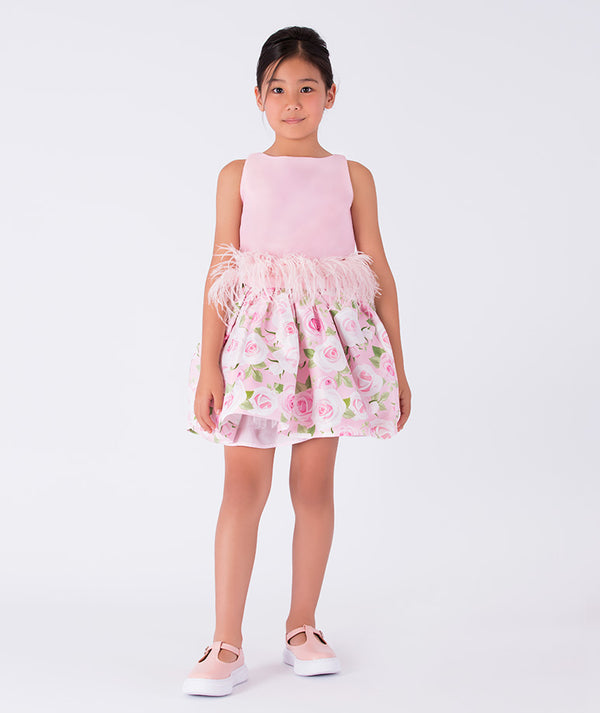 pink blouse with feathery waist and floral skirt