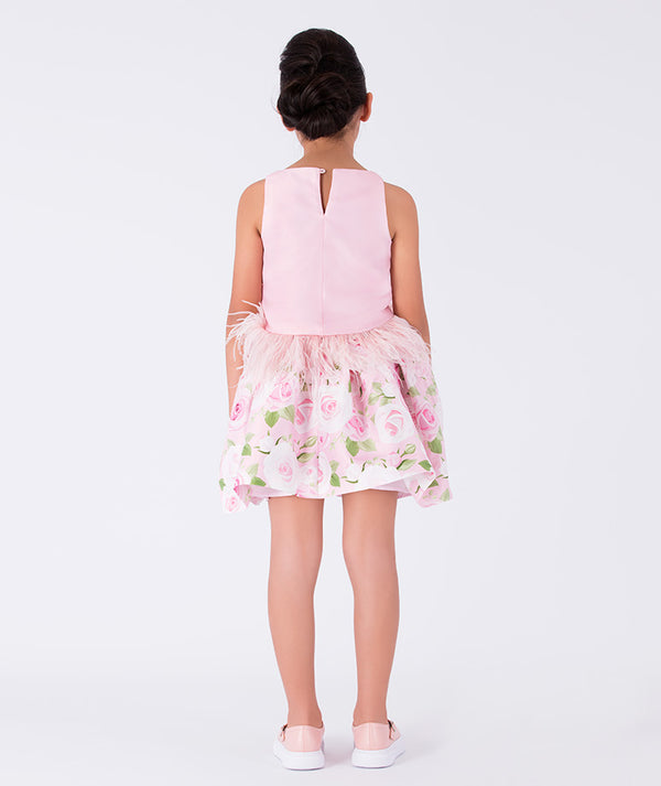 chic pink blouse with feathery waist and floral skirt