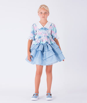 pastel ruffled blouse and baby blue layered skirt