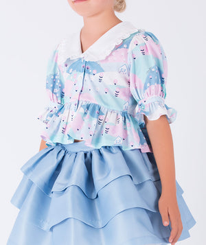 pastel ruffled blouse with white collar and baby blue layered skirt