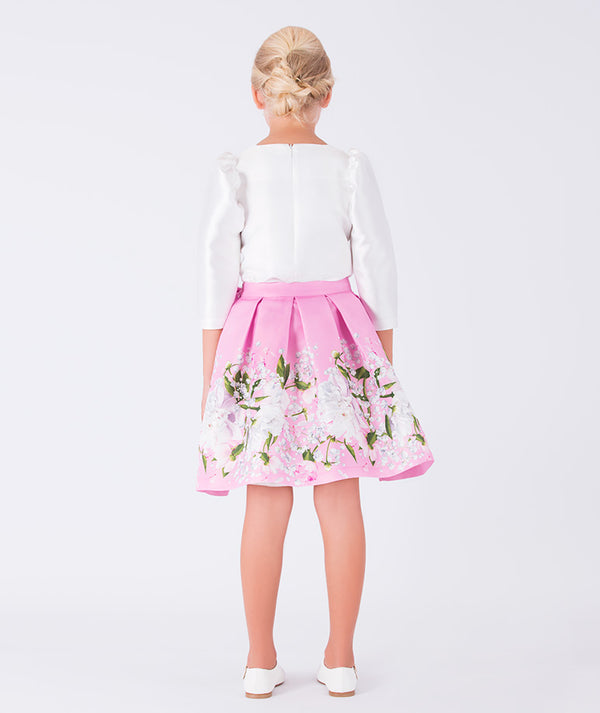 white long sleeve blouse and pink floral skirt