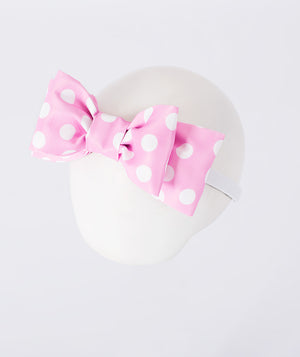 pink polka-dotted headband