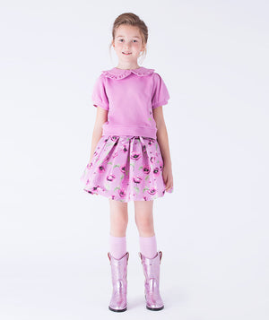 Lilac blouse with a ruffled Peter Pan collar and delicate orchid print, paired with a matching orchid-printed skirt. A charming floral ensemble for every special moment.