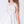 Load image into Gallery viewer, Close up of 3D Flower Applique Girls Dress showing white satin finish fabric and dimensional flower applique detail.
