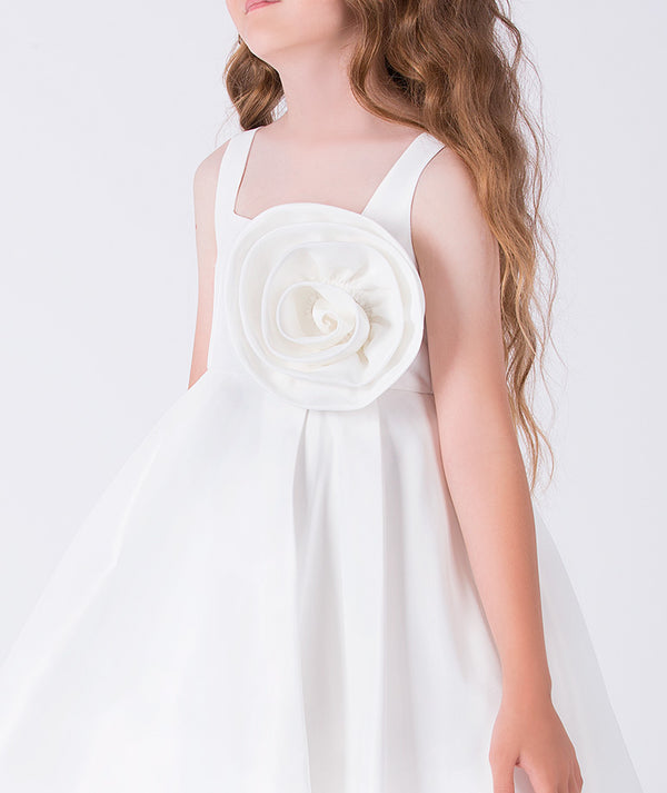 Close up of 3D Flower Applique Girls Dress showing white satin finish fabric and dimensional flower applique detail.