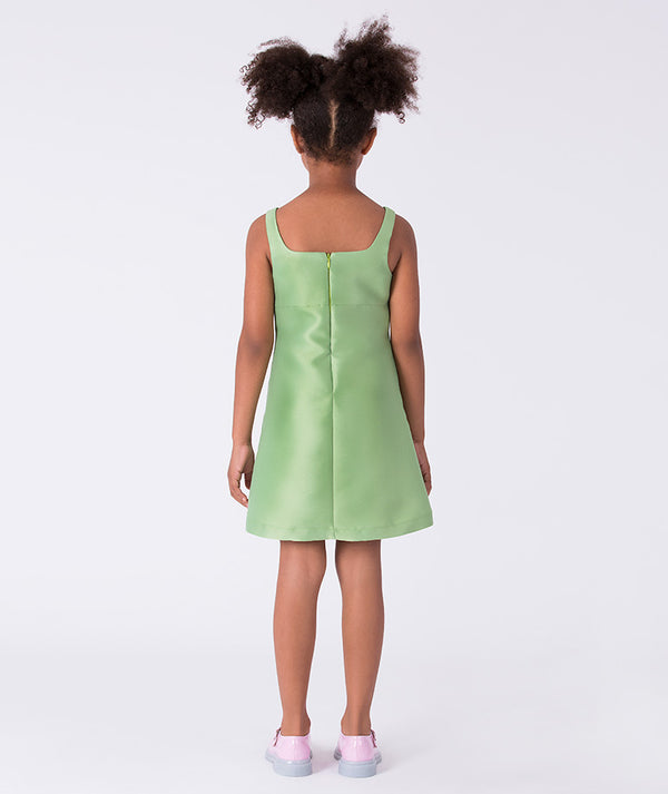 Back view of a flower girl wedding dress with 3D flower detail, designed for summer celebrations and elegant occasions for ages 3–12