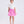 Load image into Gallery viewer, 3D flower detail girls outfit worn by a 6-year-old girl, featuring a sculptural white top and flared pink skirt for special occasions.
