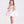 Load image into Gallery viewer, 3D flower strap baby girl dress worn by a toddler, featuring wide ribbon straps, straight neckline and a voluminous skirt for special occasions.
