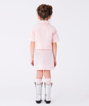 Back view of a pink satin girls’ skirt with 3D rose appliqué, elegant design for weddings, portraits, and festive occasions