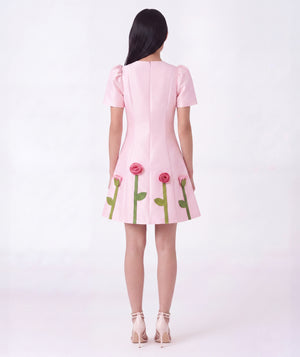 Back view of 3D Rose Appliqué Women's Dress in pink structured matte satin, highlighting neckline, sleeves and embellishments