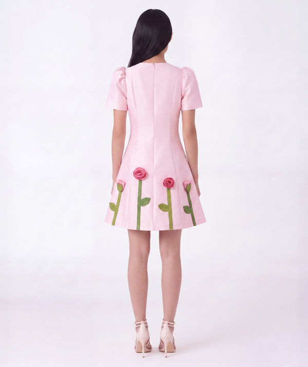 Back view of 3D Rose Appliqué Women's Dress in pink structured matte satin, highlighting neckline, sleeves and embellishments