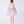 Load image into Gallery viewer, Back view of a floral chiffon girls dress by Mama Luma, showcasing a softly flared silhouette designed for elegant celebrations for ages 3–12.
