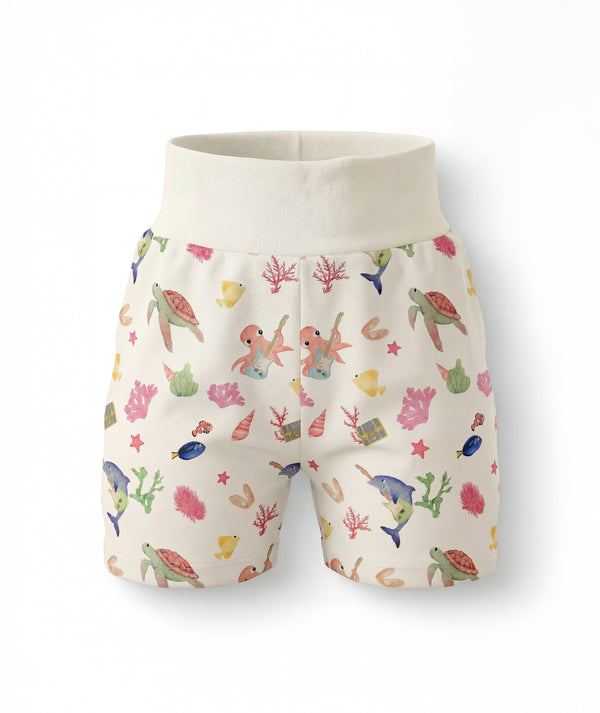Children's shorts with a colorful sea-themed pattern on a white background
