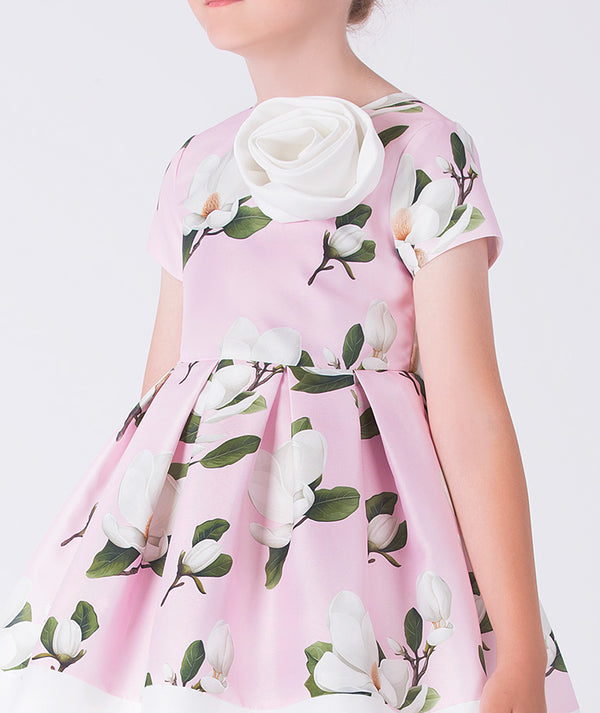 Close-up of Mama Luma girls floral dress highlighting the delicate botanical print, premium cotton fabric, and refined craftsmanship, ideal for parties and celebrations, available in sizes 3–12