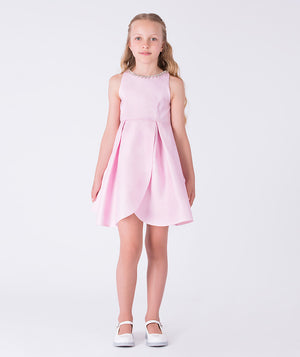 Front view of crystal neckline pink girls occasion dress by Mama Luma, sleeveless flower girl dress with pleated skirt and elegant silhouette