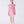 Load image into Gallery viewer, 12 years old girl wearing a pink dress with bow details on a white background
