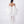 Load image into Gallery viewer, White dress with a large bow detail on a white background
